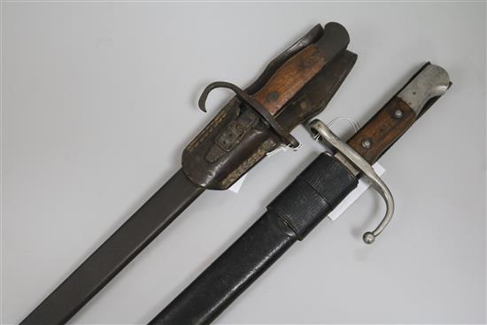 A Japanese Type 30 bayonet, with iron scabbard and leather belt frog for Type 38 rifle and a Turkish 1890 pattern Mauser bayonet, tugra